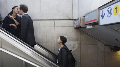 Qiwen Feng (R) exists a Metro station on her way to the Spring/Summer 2014 Ready to Wear Paris Fashion Week. Yoan Valat / EPA