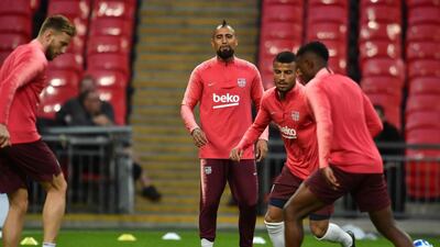 Barcelona midfielder Arturo Vidal, centre, attends a training session at Wembley Stadium. AFP