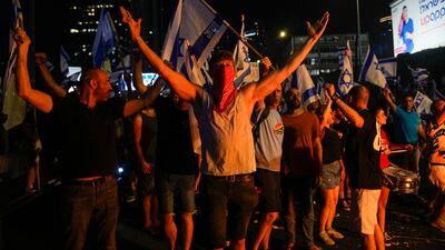 Israelis block a motorway as they protest against Prime Minister Benjamin Netanyahu's judicial reform plans. AP