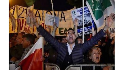 A reader says Cypriots are right to be angry about the bailout terms and should quit the euro. Filip Singer / EPA