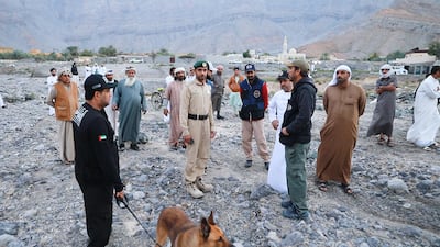 Search and rescue teams look for the body of a man who went missing in a flash flood last Saturday. Courtesy RAK Police