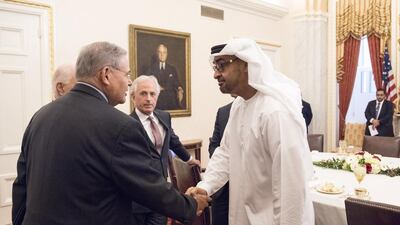 Sheikh Mohammed bin Zayed, Crown Prince of Abu Dhabi and Deputy Supreme Commander of the Armed Forces, greets Bob Menendez US Senator for New Jersey (L), prior to a lunch meeting at Capitol Hill. Seen with Bob Corker Chairman of the United States Senate Committee on Foreign Relations and Senator for Tennessee (back C). Rashed Al Mansoori / Crown Prince Court - Abu Dhabi )