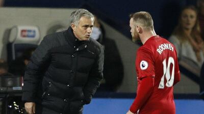 Jose Mourinho, left, should take credit for finding a role for Wayne Rooney. Phil Noble / Reuters