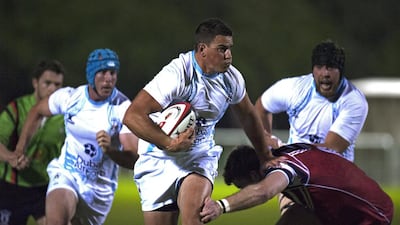 Justin Walsh, centre, and his UAE teammates faced Lloyd’s, a physical London-touring side, last night at Dubai. Jeff Topping / For The National