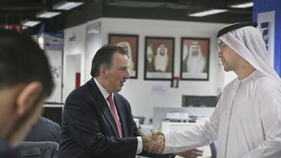 Mohammed Al Otaiba, the editor-in-chief of The National, welcomes Mexico’s foreign secretary, Jose Antonio Meade, to the newspaper’s newsroom yesterday. Delores Johnson / The National