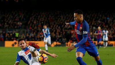 Barcelona forward Neymar attempts to take on Espanyol’s Pablo Piatti. Albert Gea / Reuters