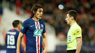 Edinson Cavani talks to the referee on Wednesday night. Reuters