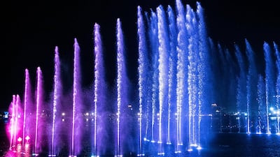 Water shoots high into the sky at Dubai's newest attraction, the Palm Fountain