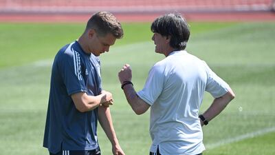 Joachim Low talks to Matthias Ginter. AP