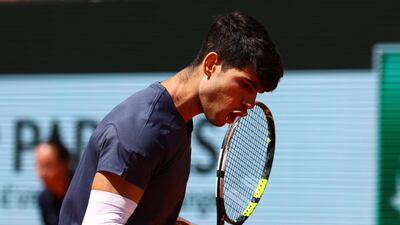 Carlos Alcaraz reacts during his semi-final against Jannik Sinner. Reuters