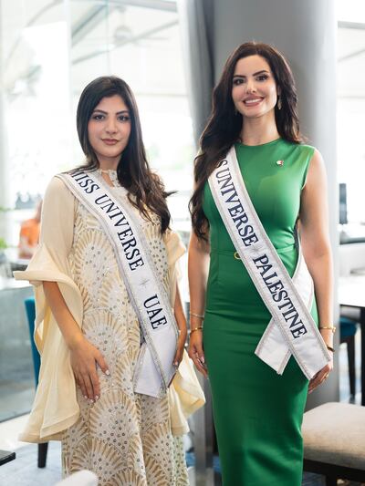 Miss Universe UAE Mariam Mohamed, left, and Miss Universe Palestine, Nadeen Ayoub arrive in Thailand for the 2025 pageant. Photo: Miss Palestine Organisation