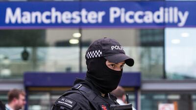 An armed police officer stands at Manchester Piccadilly railway station in Manchester, U.K., on Tuesday, May 23, 2017. At least 22 people were killed in a suicide bombing at a pop concert packed with children in the northern English city of Manchester, in the worst terror incident on British soil since the London bombings of 2005. Photographer: Matthew Lloyd/Bloomberg