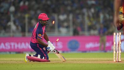 Rajasthan Royals' captain Sanju Samson reacts after he was stumped by Royal Challengers Bengaluru's wicketkeeper Dinesh Karthik for 17. AP