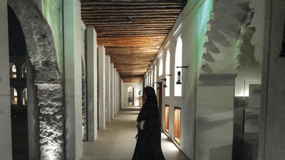 A visitor walks the halls inside Qasr Al Hosn. Victor Besa / The National