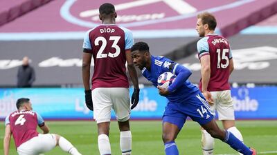 Kelechi Iheanacho rushes back to restart the match after scoring his, and Leicester's, second goal in injury time. EPA