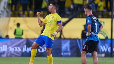 Cristiano Ronaldo celebrates after scoring Al Nassr's third goal during the Saudi Pro League football match against Al Wehda at Al-Awwal Stadium in Riyadh on May 4, 2024. AFP