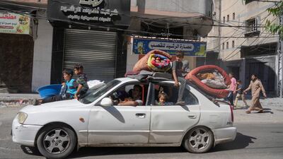 Palestinians flee from northern Gaza to the south on Friday. AP