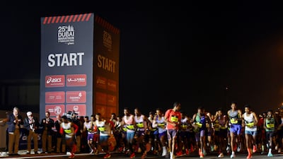 A tense moment before sunrise as athletes wait for the start of the Dubai Marathon 2026