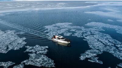 The Kvitbjorn (Norwegian for polar bear, a hybrid tourist boat that combines a diesel motor and electric batteries, makes its way through the sea ice in Borebukta Bay on the north-west side of Isfjorden, in Svalbard archipelago, northern Norway. Home to polar bears, the midnight sun and the northern lights, the Norwegian archipelago perched high in the Arctic is trying to find a way to profit from its pristine wilderness without ruining it. AFP
