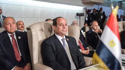 Egyptian President Abdel Fattah El Sisi, centre, and his Foreign Minister Sameh Shoukry, left, attend the oppening of the 30th Arab Summit in Tunis, Tunisia. AP