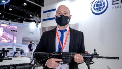Ron Pollak, vice president of sales and marketing at Emtan, carrying a MZ-4P automatic rifle