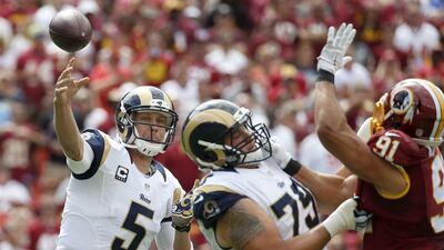 Nick Foles of the St Louis Rams shown attempting a pass in their loss on Sunday in the NFL. Alex Brandon / AP / September 20, 2015