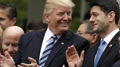 The US president Donald Trump with House speaker Paul Ryan in the Rose Garden of the White House on May 4, 2017. Evan Vucci / AP Photo