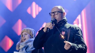 Pawel Adamowicz speaks during the grand finale of the Great Orchestra of Christmas Charity in Gdansk before he was stabbed. Reuters