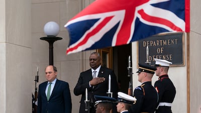 US Defence Secretary Lloyd Austin, right, with Mr Wallace during an honour cordon ceremony at the Pentagon in May. AP