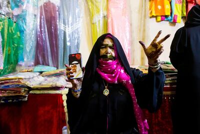 Fatima al Hameli, an Emirati woman, at the traditional souk during the Liwa Date Festival in 2017. Christopher Pike / The National