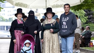 Teachers Ali and Samira from Saudi Arabia join local residents for the traditional feast of Zell Edelweisen.