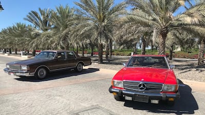 A Mercedes-Benz 450 SL, right, and a Chevrolet Caprice Classic Brougham. Adam Workman / The National