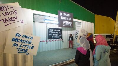 Dubai, UAE - January 24, 2014 - Street Night Art in Al Quoz is a community event to help beautify the industrial area of Al Quoz and is said to be the largest outdoor gallery to date in the UAE. Photo by Clint McLean for The National Story: Street Art Night Reporter: Anna Seaman Photo Editor: Julie Nicholson