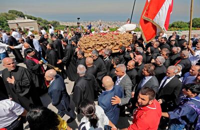 Lebanese monks carry the coffin of Nasrallah Sfeir in the mountain village of Bkerki, northeast of Beirut. Joseph Eid / AFP