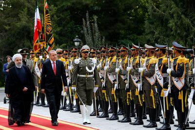 Turkish president Recep Tayyip Erdogan is seen with Iranian president Hassan Rouhani during a welcoming ceremony in Tehran, Iran on October 4, 2017. Kayhan Ozer / Presidential Palace/ Reuters