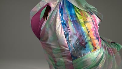 Part of the Artist series, this hand-painted piece was created by artist Najat Makki in 2018, and was made into a kandurah overlaid with a shimmering thawb. It is worn with boots by Christian Louboutin.