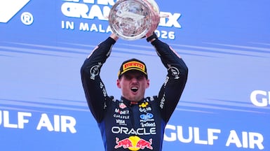 KUALA LUMPUR, MALAYSIA - OCTOBER 04: Race winner Max Verstappen of the Netherlands and Oracle Red Bull Racing celebrates on the podium during the F1 Grand Prix of Bahrain in Malaysia at Sepang Circuit on October 04, 2026 in Kuala Lumpur, Malaysia. (Photo by Sona Maleterova / Getty Images)