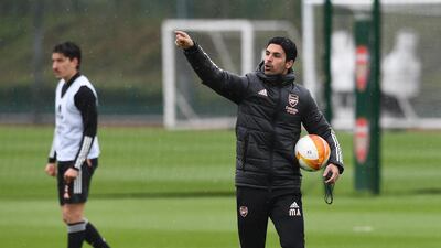 Mikel Arteta oversees Arsenal's training. Getty