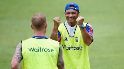 Former England player Mark Ramprakash celebrates a goal with Ben Stokes in Durban.