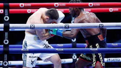 Southpaw Terence Crawford throws a left against Israel Madrimov. Getty Images