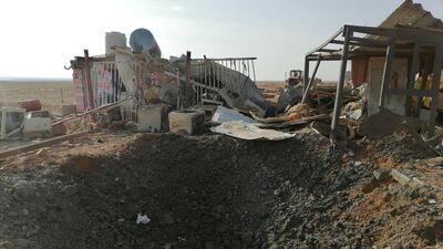 A hole left after the US air strike in Qaim, Iraq, Reuters