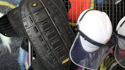 The safety gear includes a chest and back protector as well as a helmet. Chris Whiteoak / The National