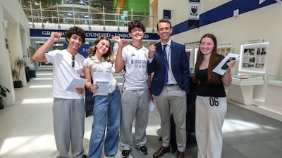 Ibrahim Dobia, Raya Al Rifai, Zaid Abu Elsameed and Isobelle Hilliard celebrate with Repton's vice principal Stephen Davis