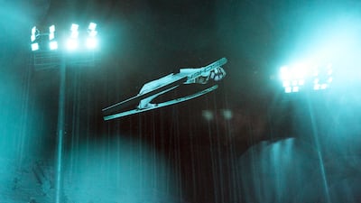 Photographers Pauline Ballet, Ryan Pierse and Hector Vivas participated in the project using thermal and infrared cameras plus a 70-year-old Graflex bellows camera for Getty Images, the IOC's official agency. Here, Kacper Tomasiak of Team Poland jumps during the men's large hill individual trial round on day eight of the Milano Cortina 2026 Winter Olympic games at Predazzo Ski Jumping Stadium on February 14, 2026 in Val di Fiemme, Italy