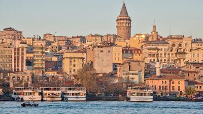 Small passenger ferries on the Bosphorus in Istanbul, with a view of the Galata Tower in the background. Many of the city’s iconic sights are visible from the river, including the Hagia Sophia. Getty Images