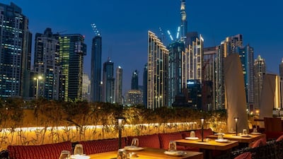 The terrace at Roka Dubai in The Opus by Omniyat also offers great views of the world's tallest building. Photo: Instagram / @rokadubaiofficial