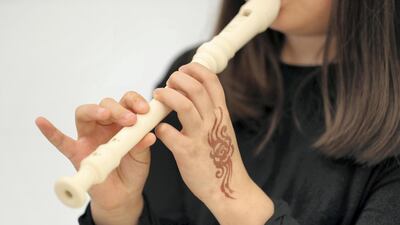A Repton School pupil displays her musical skills