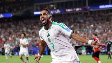Riyad Mahrez celebrates after scoring to make it 2-2 against Austria. AFP