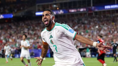 Riyad Mahrez celebrates after scoring to make it 2-2 against Austria. AFP