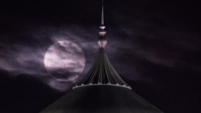 The supermoon is seen past the dome of the prime minister’s Office complex in Putrajaya, Malaysia on November 14. Mohd Rasfan / AFP Photo
